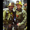 photograph of two firefighters